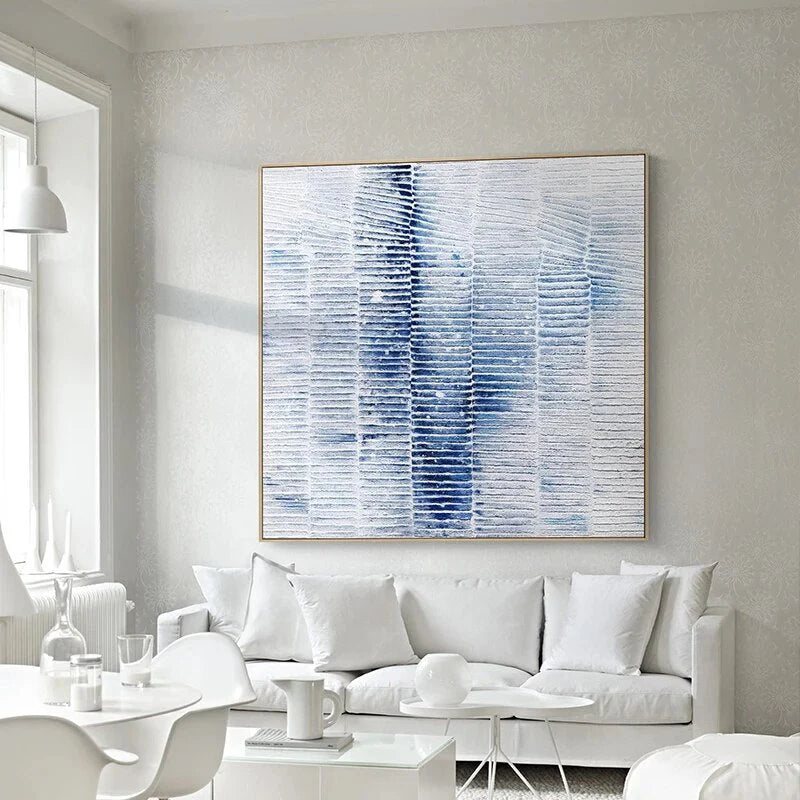 Modern living room with a large abstract painting on the wall