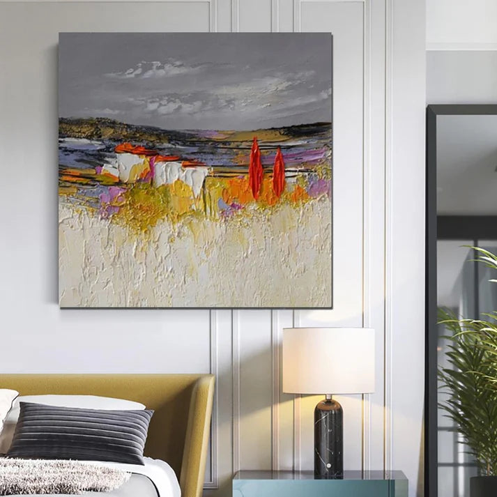 Abstract painting on a wall above a bed in a bedroom setting