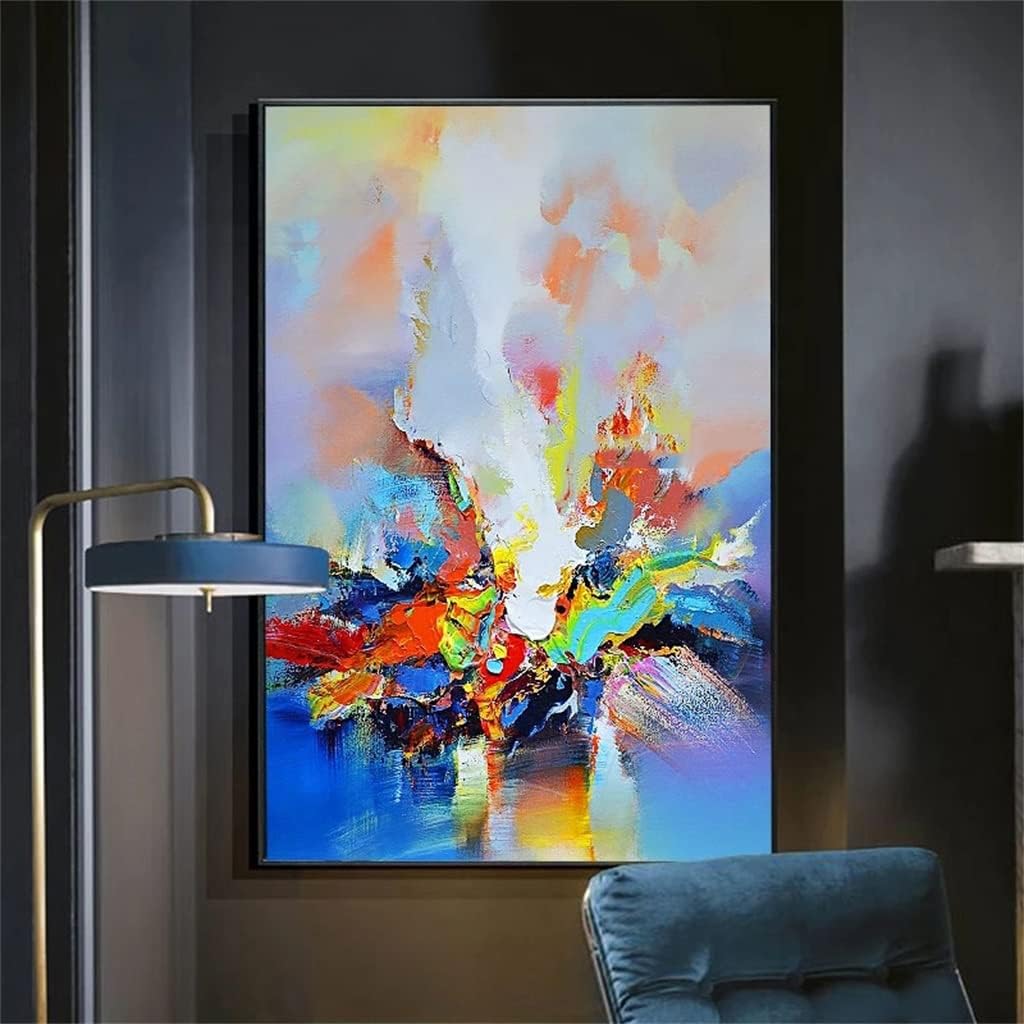 Colorful abstract painting in a modern living room setting with a lamp and chair.