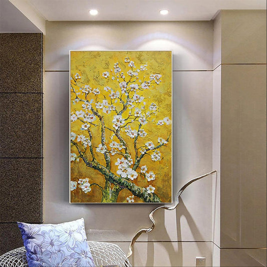 Painting of a floral branch on a wall in a modern interior setting
