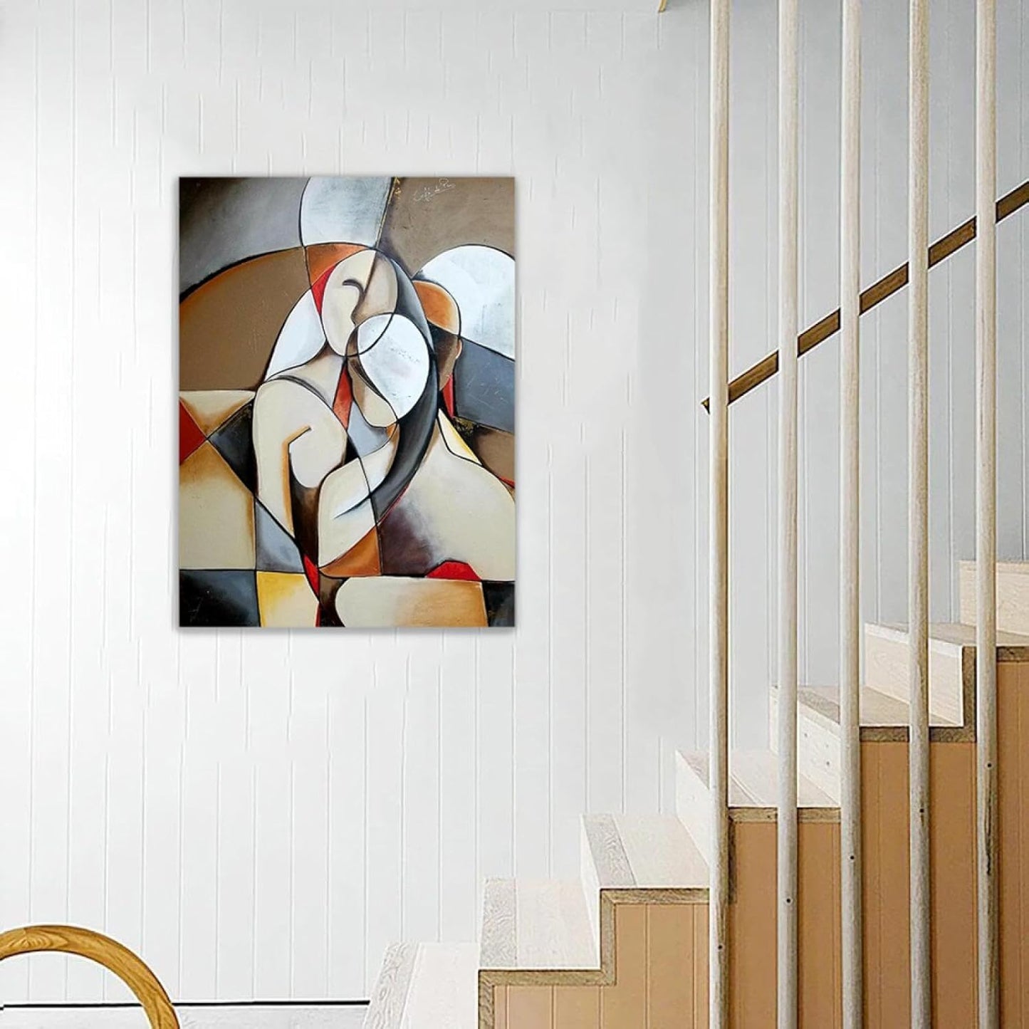 Abstract painting on a wall above a staircase