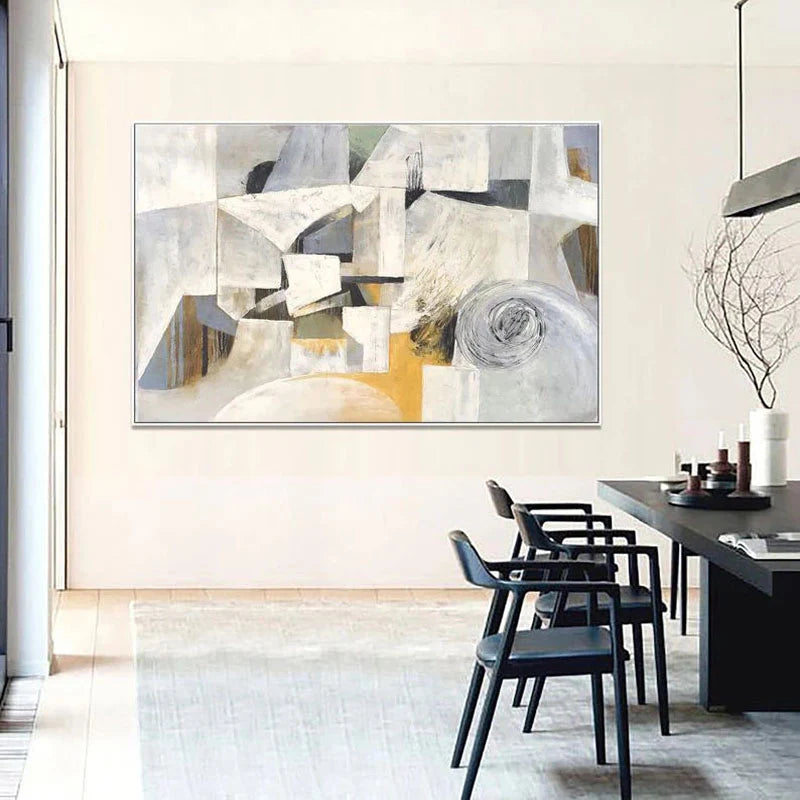 Abstract art piece on a wall in a modern dining room