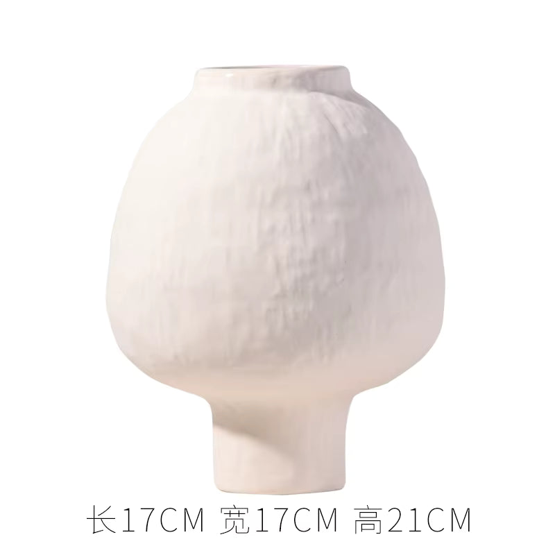 White ceramic vase on a white background with dimensions displayed.