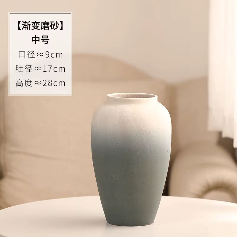 Gray gradient vase on a neutral background with text overlay