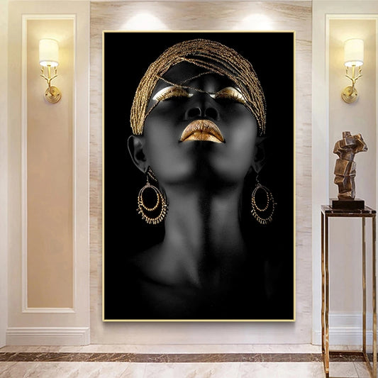 Framed artwork of a stylized face with gold accents on a wall in a stylish room.