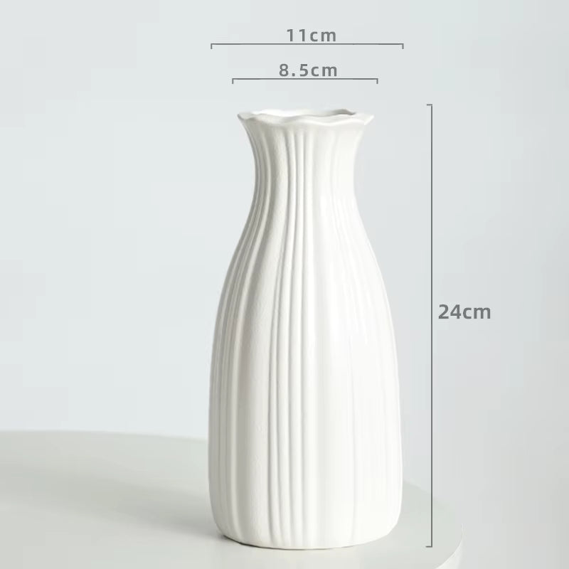 White ceramic vase with dimensions on a light gray background