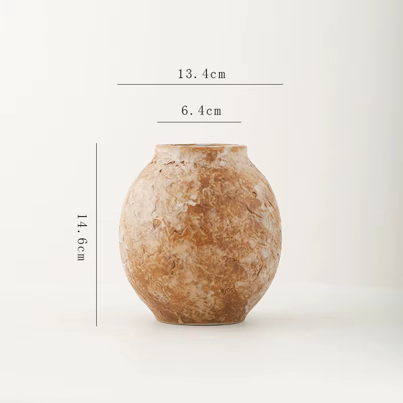 Brown ceramic vase with measurements on a white background