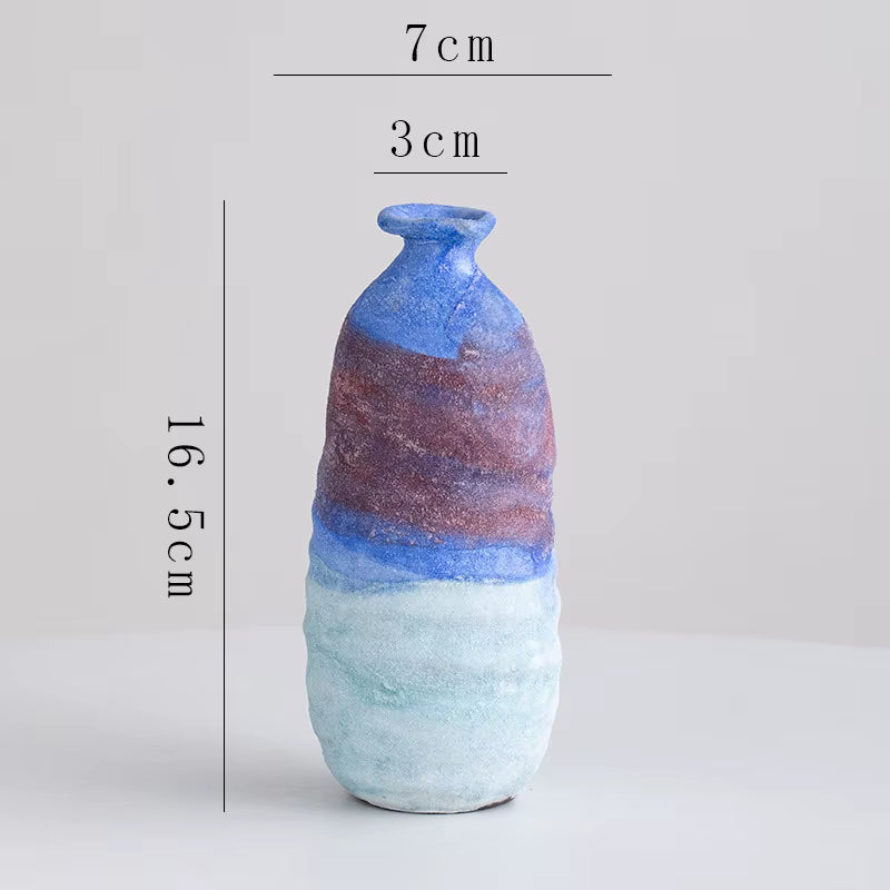 Multicolored vase with measurements on a light gray background