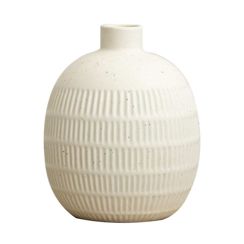 White textured vase on a white background
