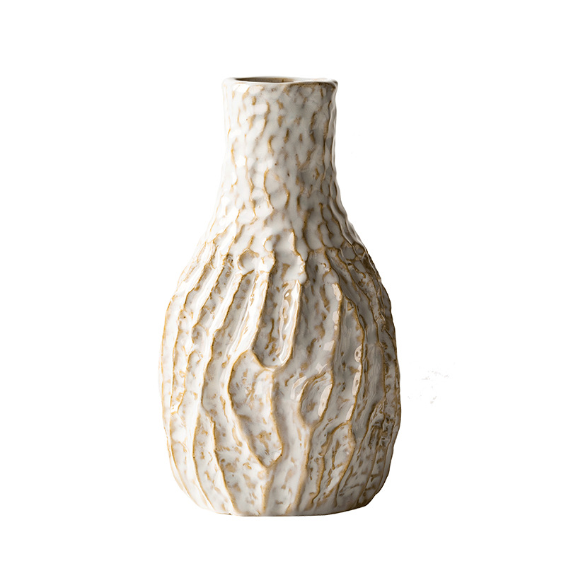 Textured ceramic vase on a white background