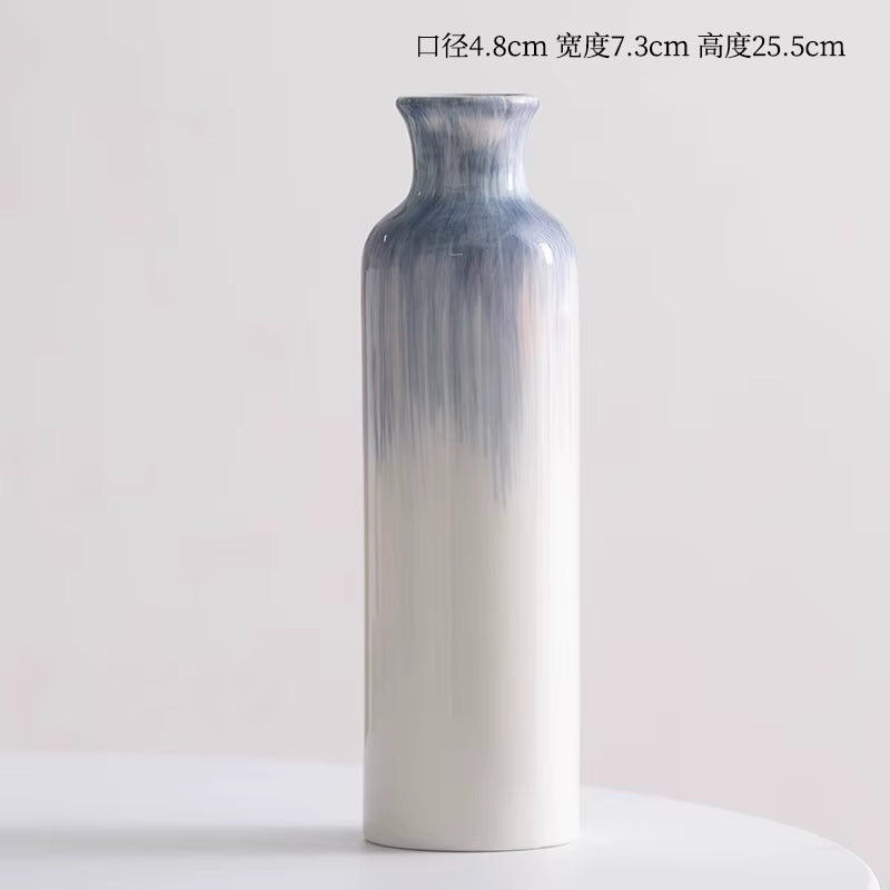 Decorative vase with gradient design on a light background