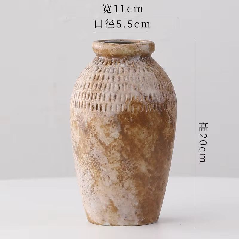 Brown ceramic vase with measurements on a white background