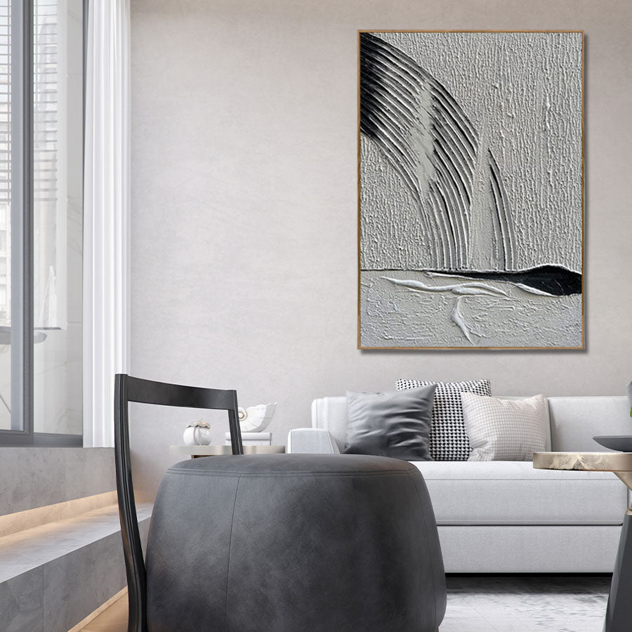 Abstract art piece on a wall in a modern living room