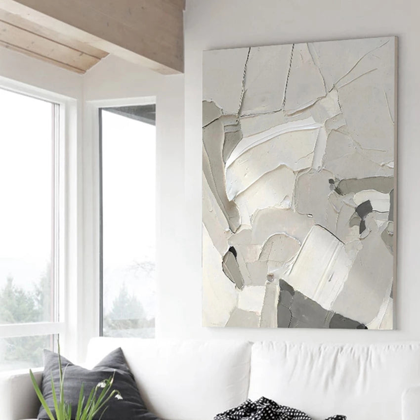 Abstract art piece on a wall in a modern living room