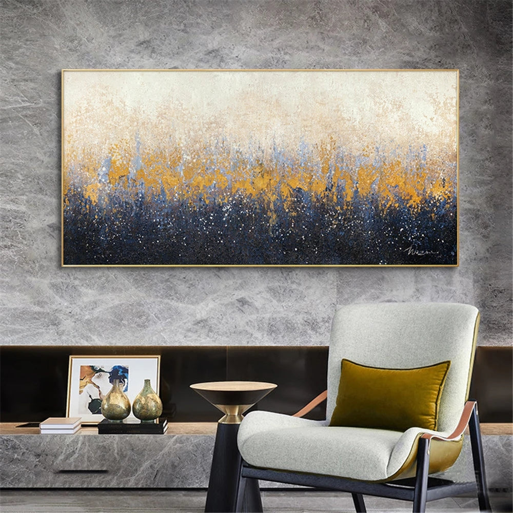 Modern interior with abstract painting, chair, and decorative items on a gray wall.