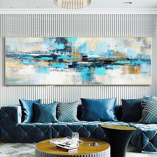 Modern living room with a blue sofa, abstract painting, and decorative pillows.