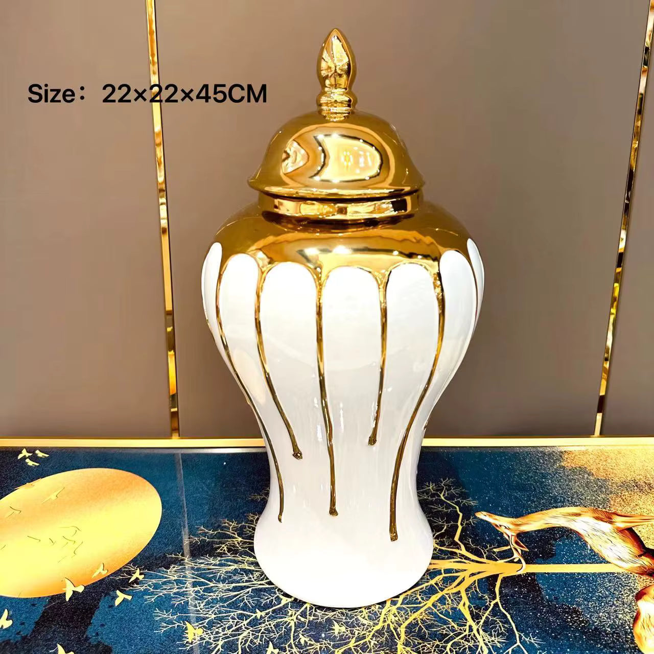 Decorative white vase with gold accents on a decorative background