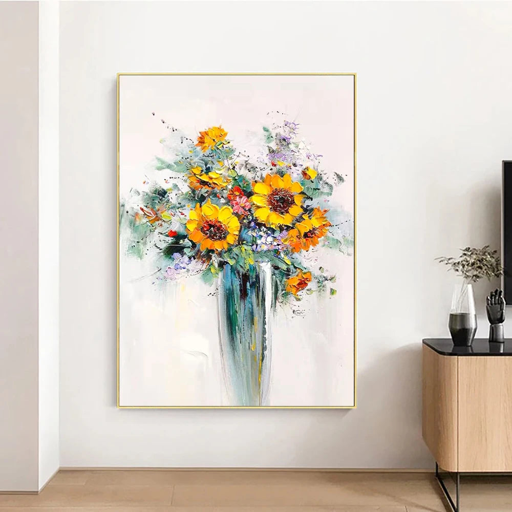 Framed painting of a colorful flower bouquet on a wall in a room.