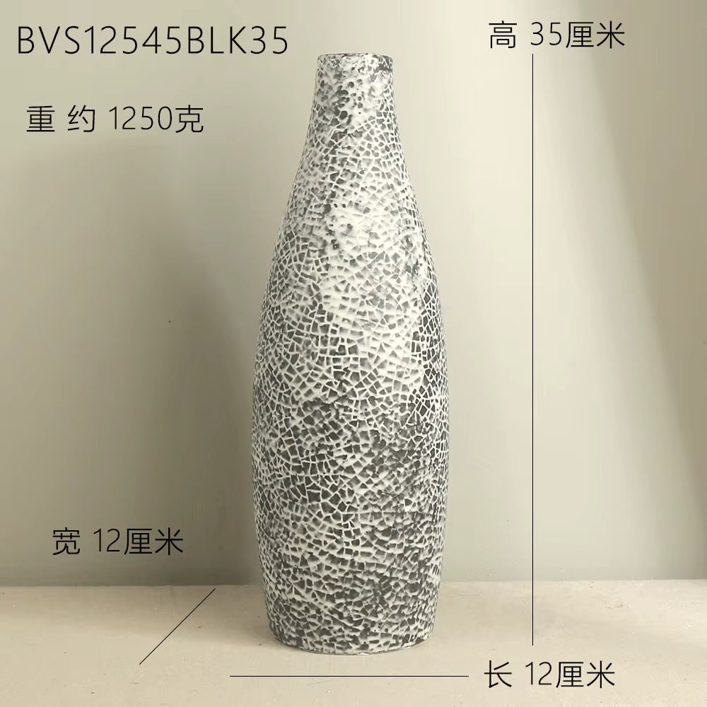 Silver textured vase on a beige background with measurements displayed.