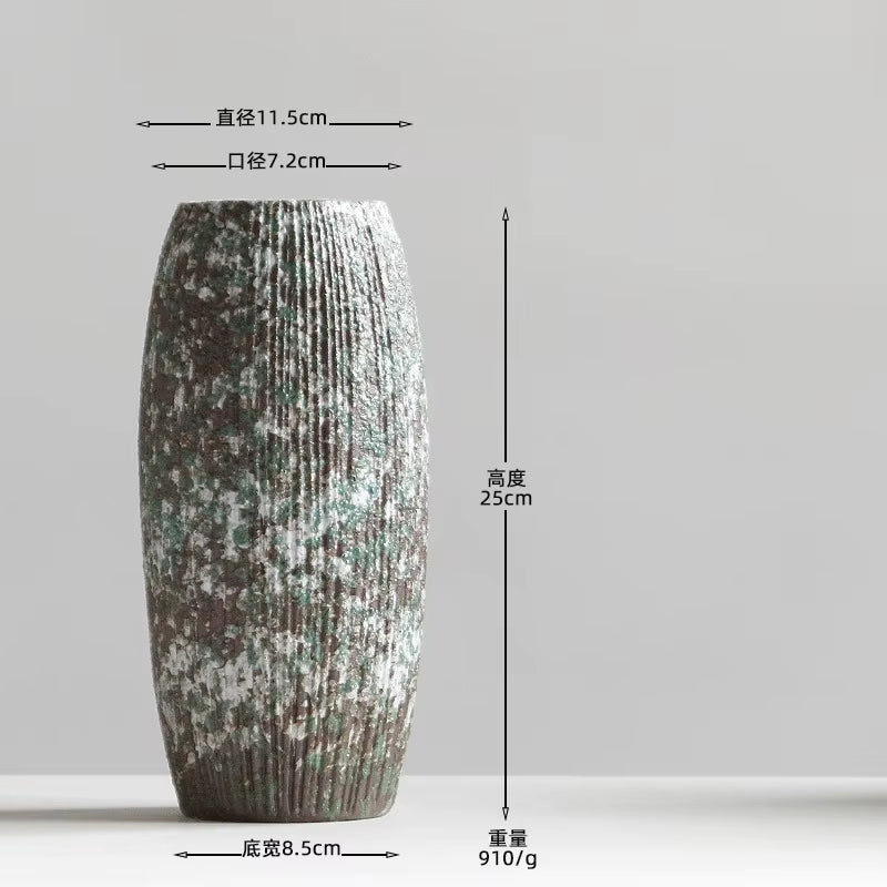 Decorative vase with measurements on a light gray background
