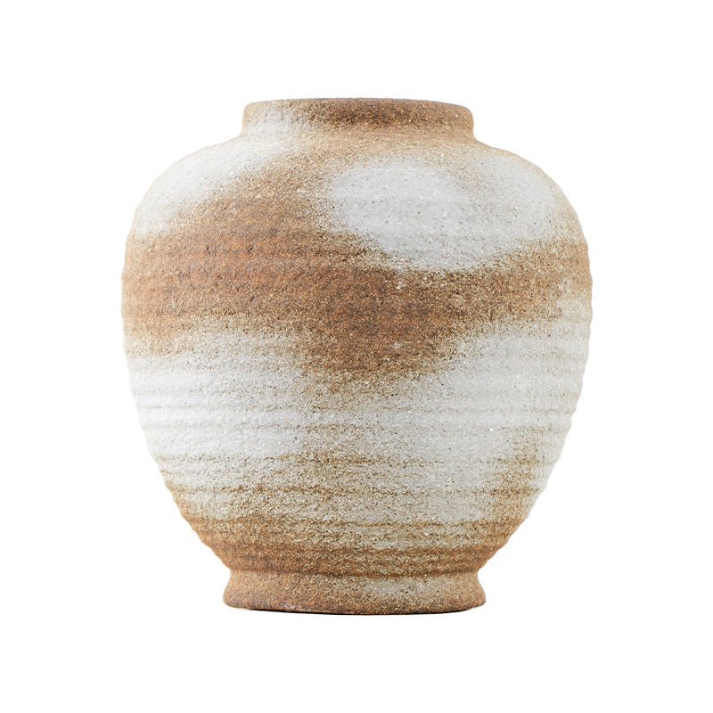 Ceramic vase with a gradient of brown and white on a white background
