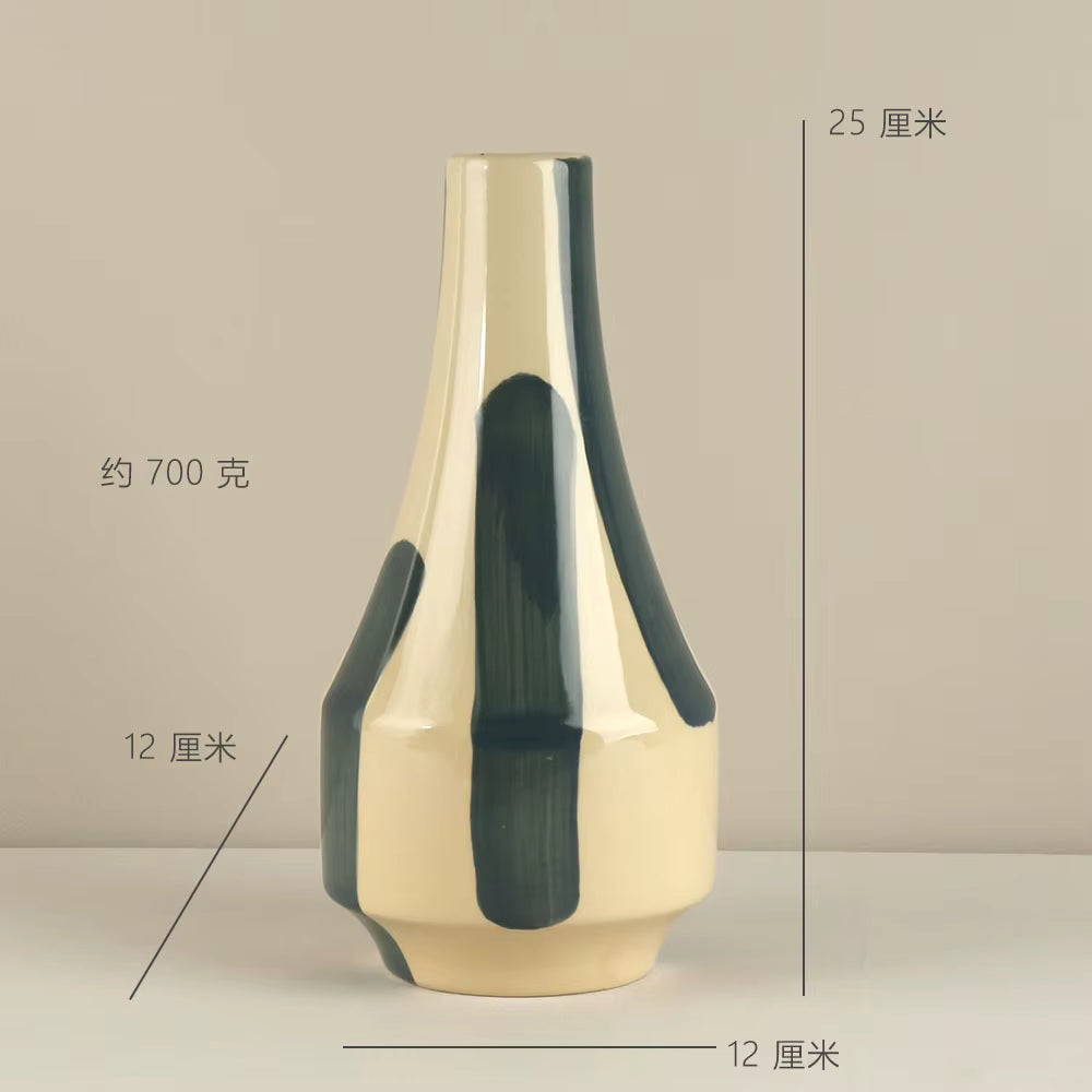 Beige and black vase with measurements on a beige background
