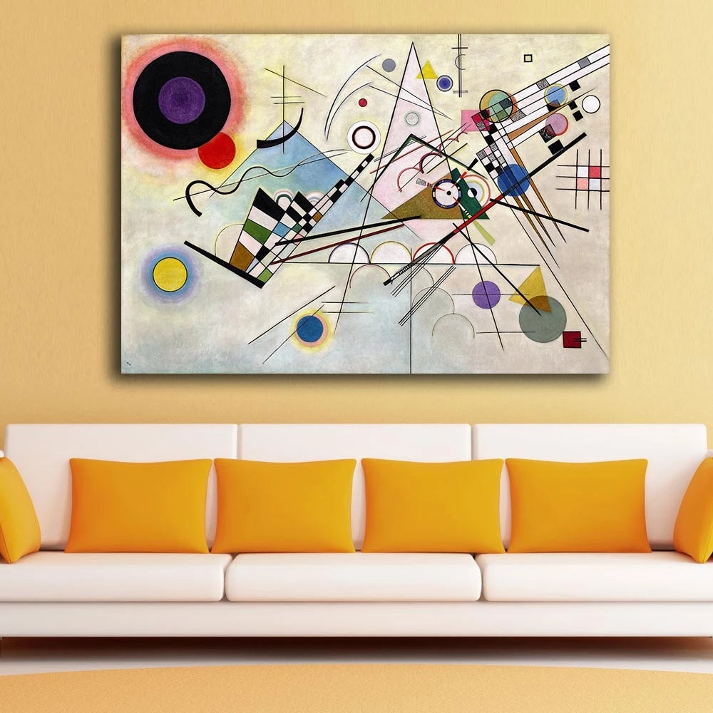 Abstract painting on a wall above a white sofa with orange cushions.