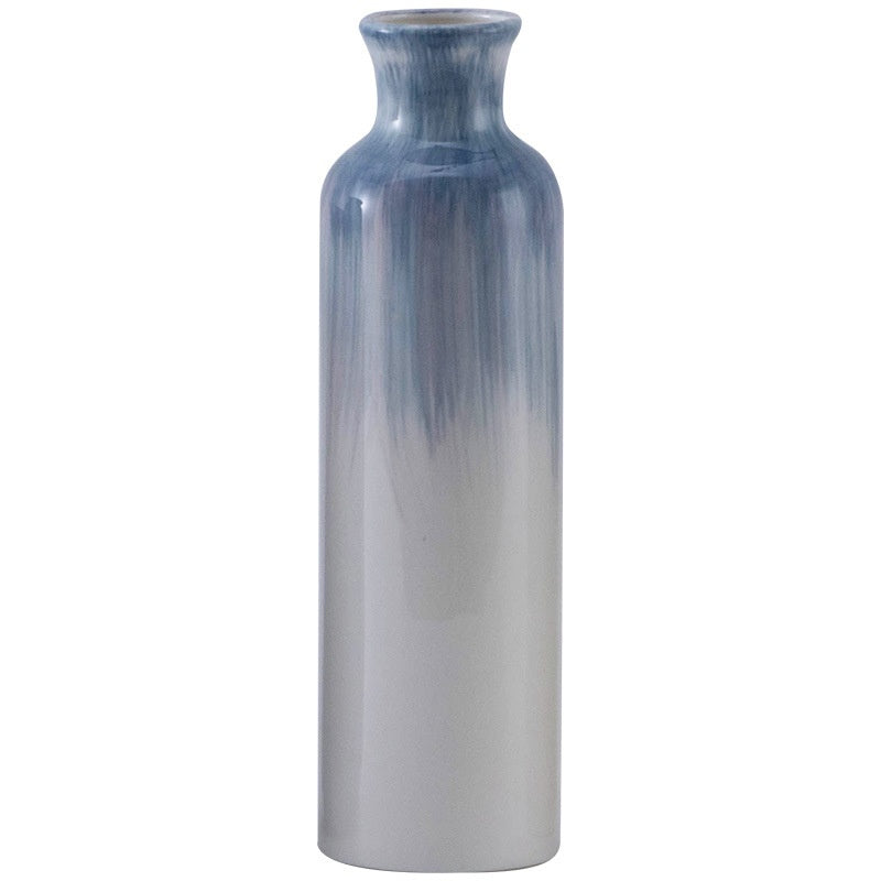 Cylindrical vase with gradient blue to gray color on a white background