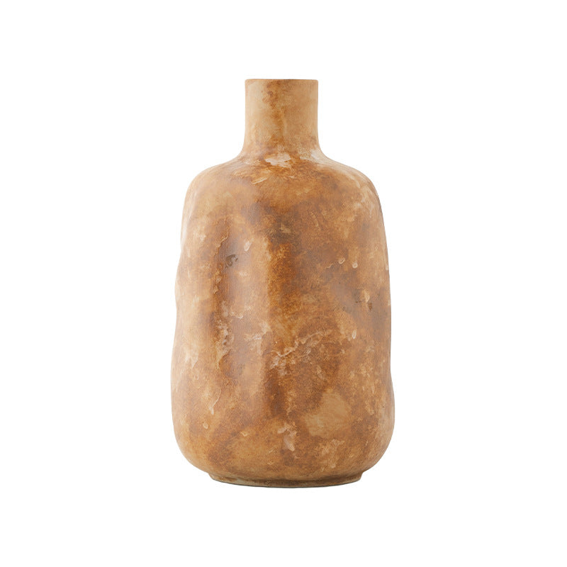 Brown ceramic vase on a white background