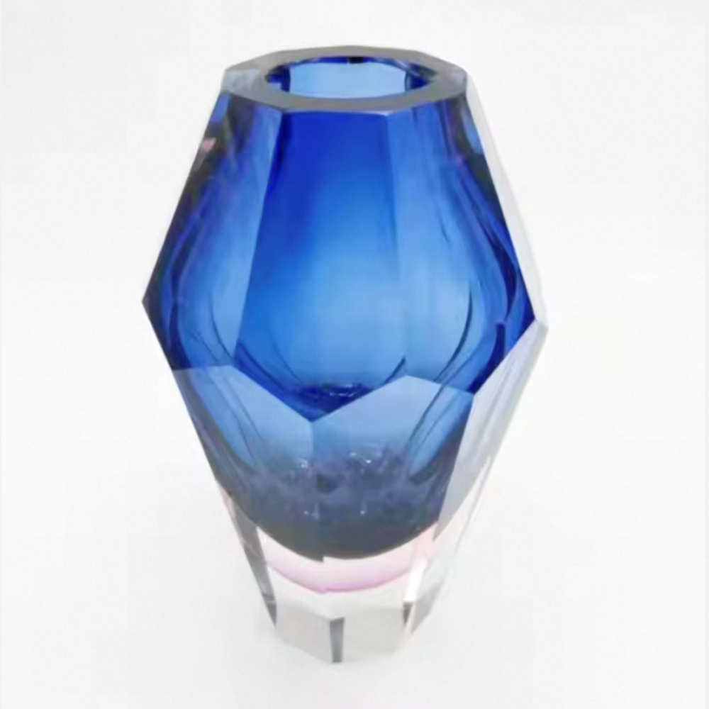 Blue glass vase on a white background