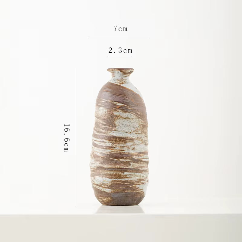 Marbled ceramic vase with dimensions on a white background