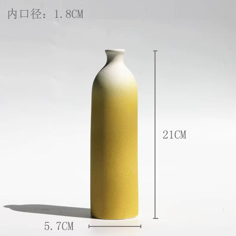 Yellow and white gradient vase with dimensions on a light gray background