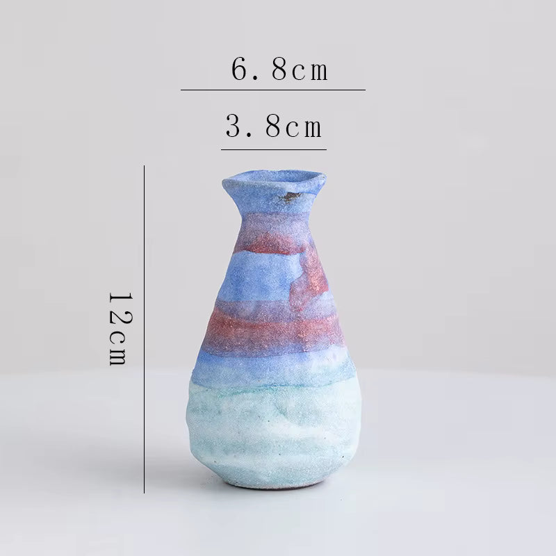 Multicolored vase with dimensions labeled on a light gray background
