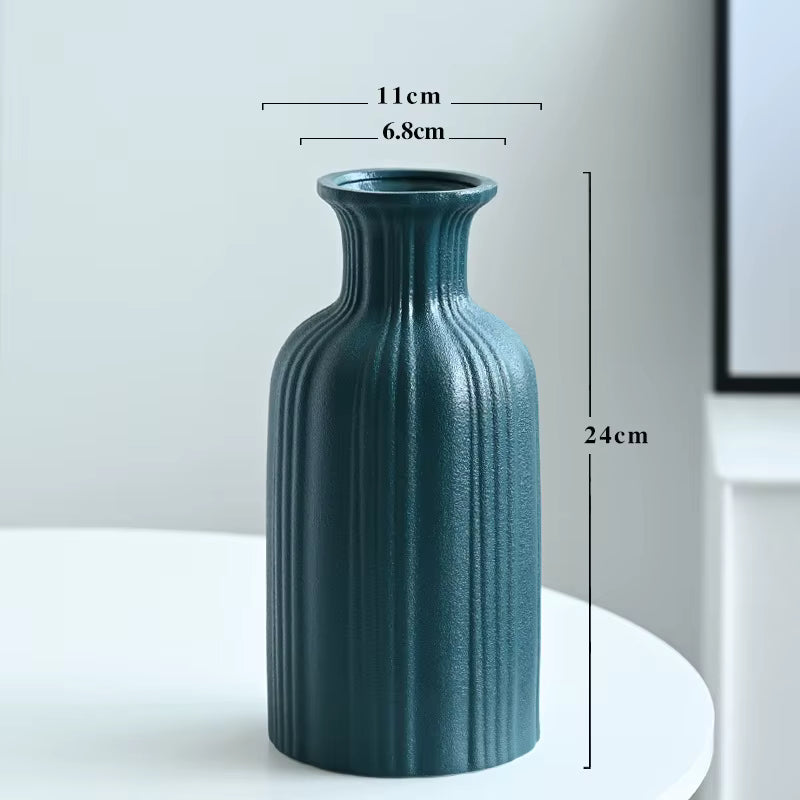 Teal textured vase with dimensions on a white background