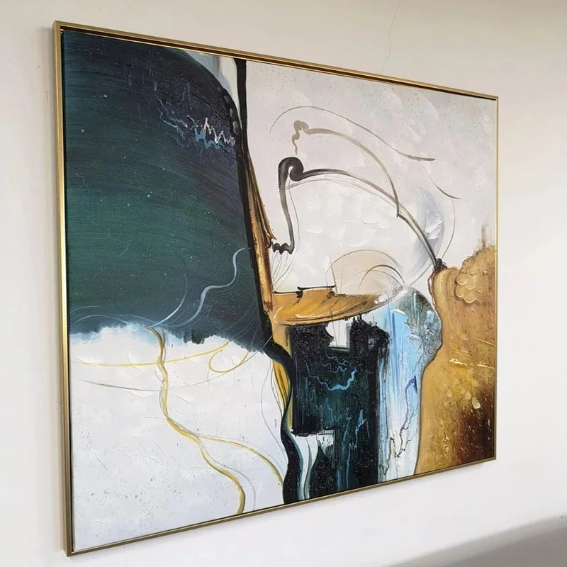 Abstract art piece with a gold frame on a white wall