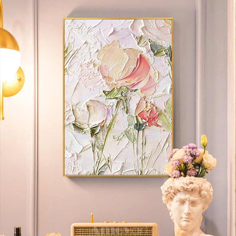 Framed floral painting on a wall with decorative elements.