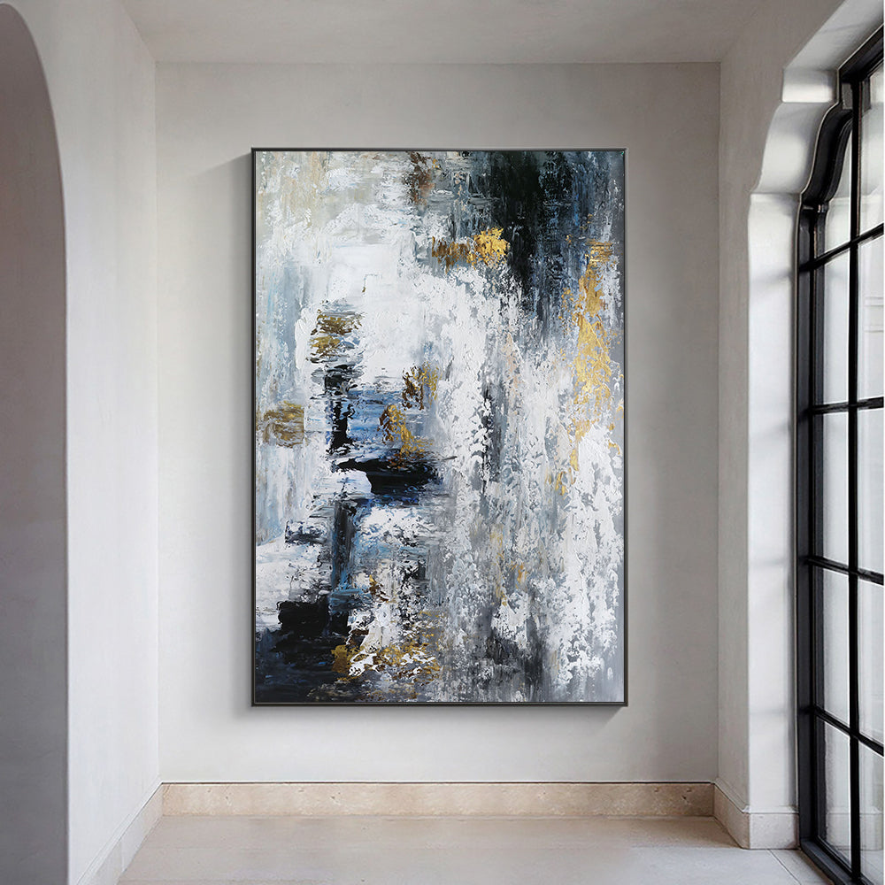 Abstract art painting in a modern interior setting with a large window.
