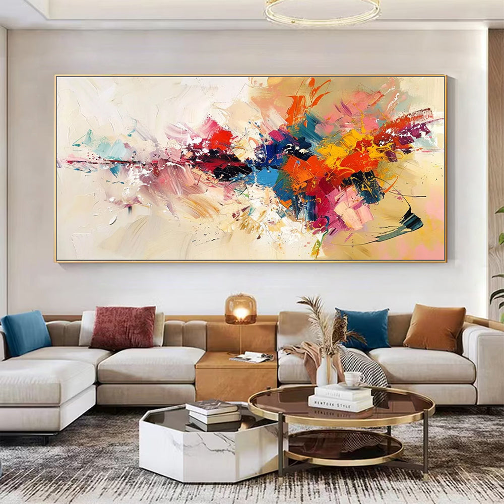 Modern living room with a colorful abstract painting on the wall above a sectional sofa.