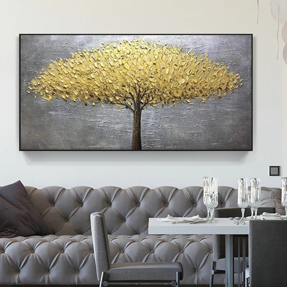 Abstract painting of a tree with yellow leaves on a gray background, displayed above a sofa in a living room.