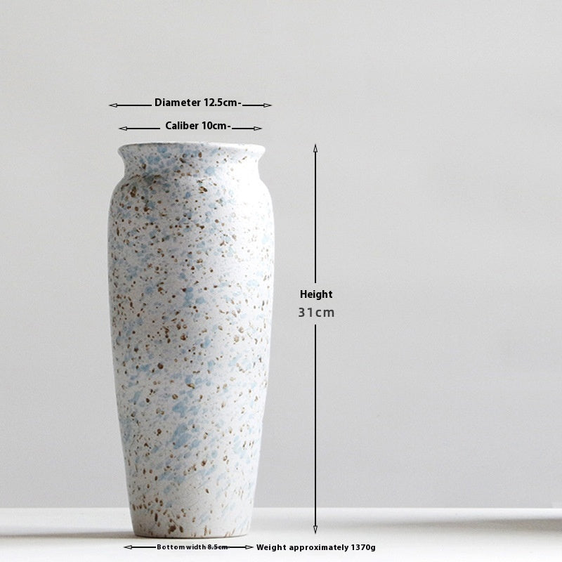 Ceramic vase with measurements on a white background