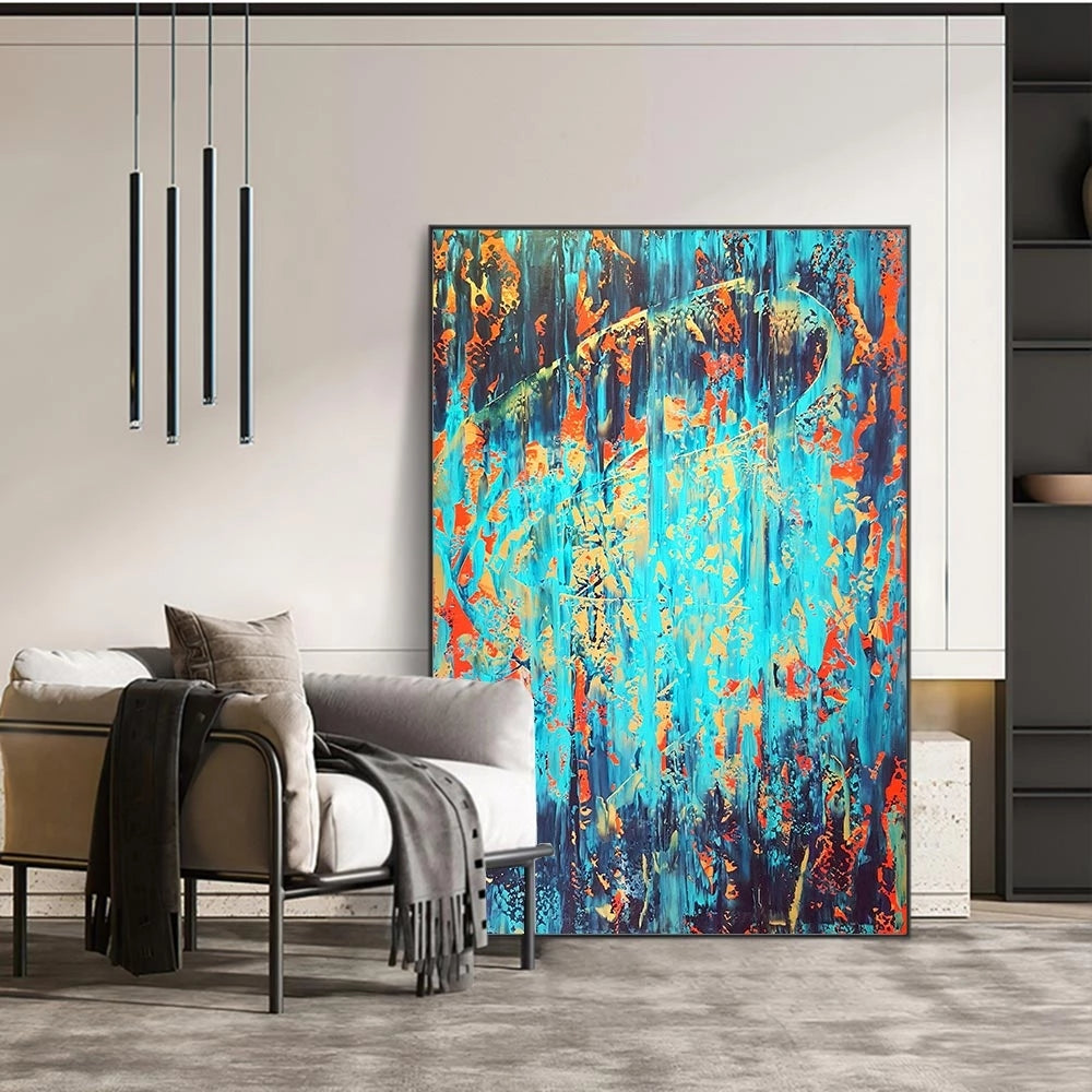 Abstract painting in a modern living room with a sofa and decorative elements.