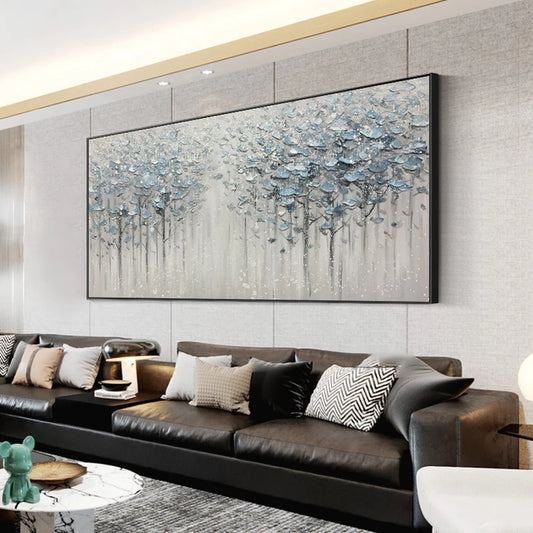 Living room with a large abstract painting above a brown sofa