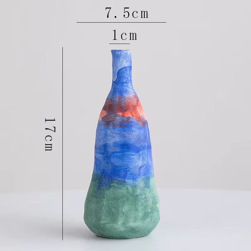Colorful vase with measurements on a white background