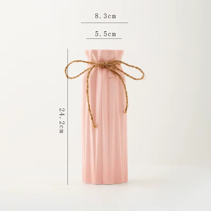 Pink wine bottle gift bag with measurements on a white background
