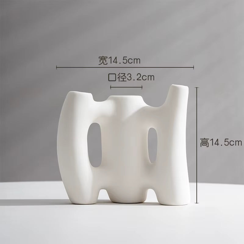 White abstract vase with dimensions on a gray background