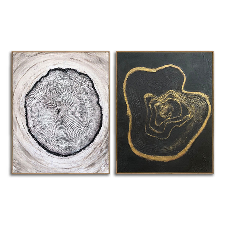 Two abstract art pieces, one black and white and the other gold on black, on a white background.