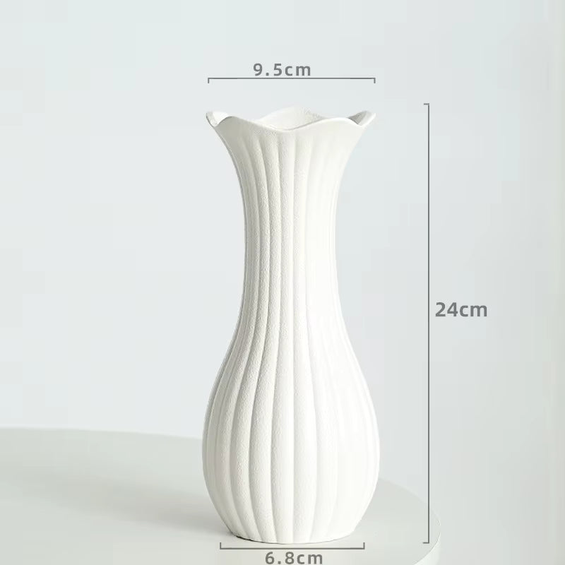 White vase with dimensions labeled on a white background