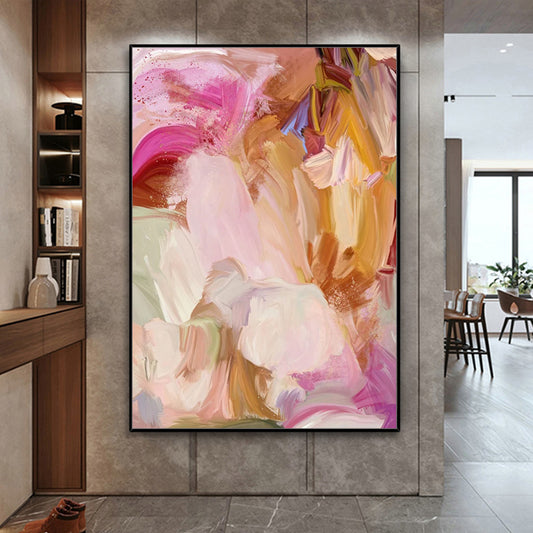 Abstract painting with pink, yellow, and white colors on a wall in a modern interior setting.