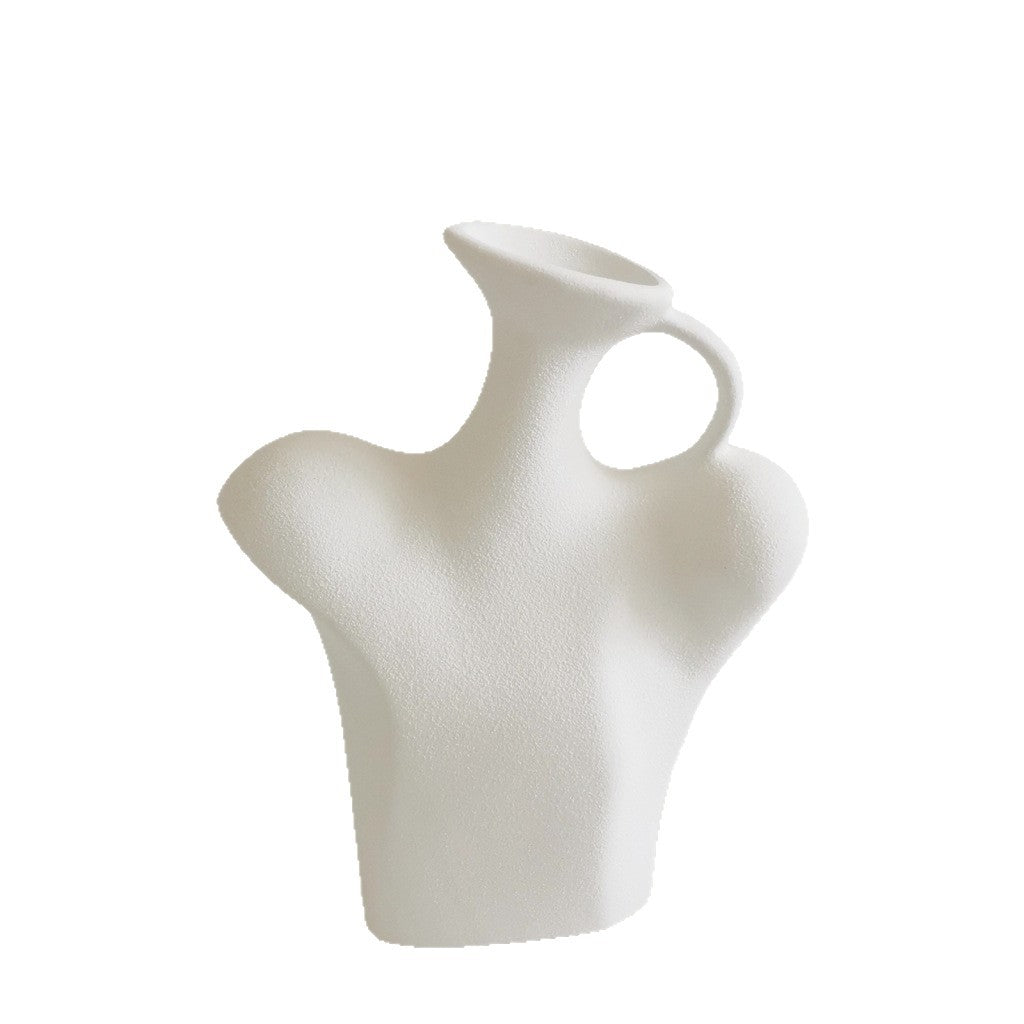 White ceramic vase on a white background