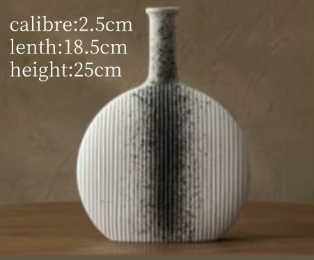 Textured vase on a wooden surface with measurements displayed